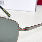 Metal sunglasses hinge detail with multicolor stripe and small emblem