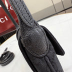 Gucci bag handle, textured black leather with teardrop-shaped connector