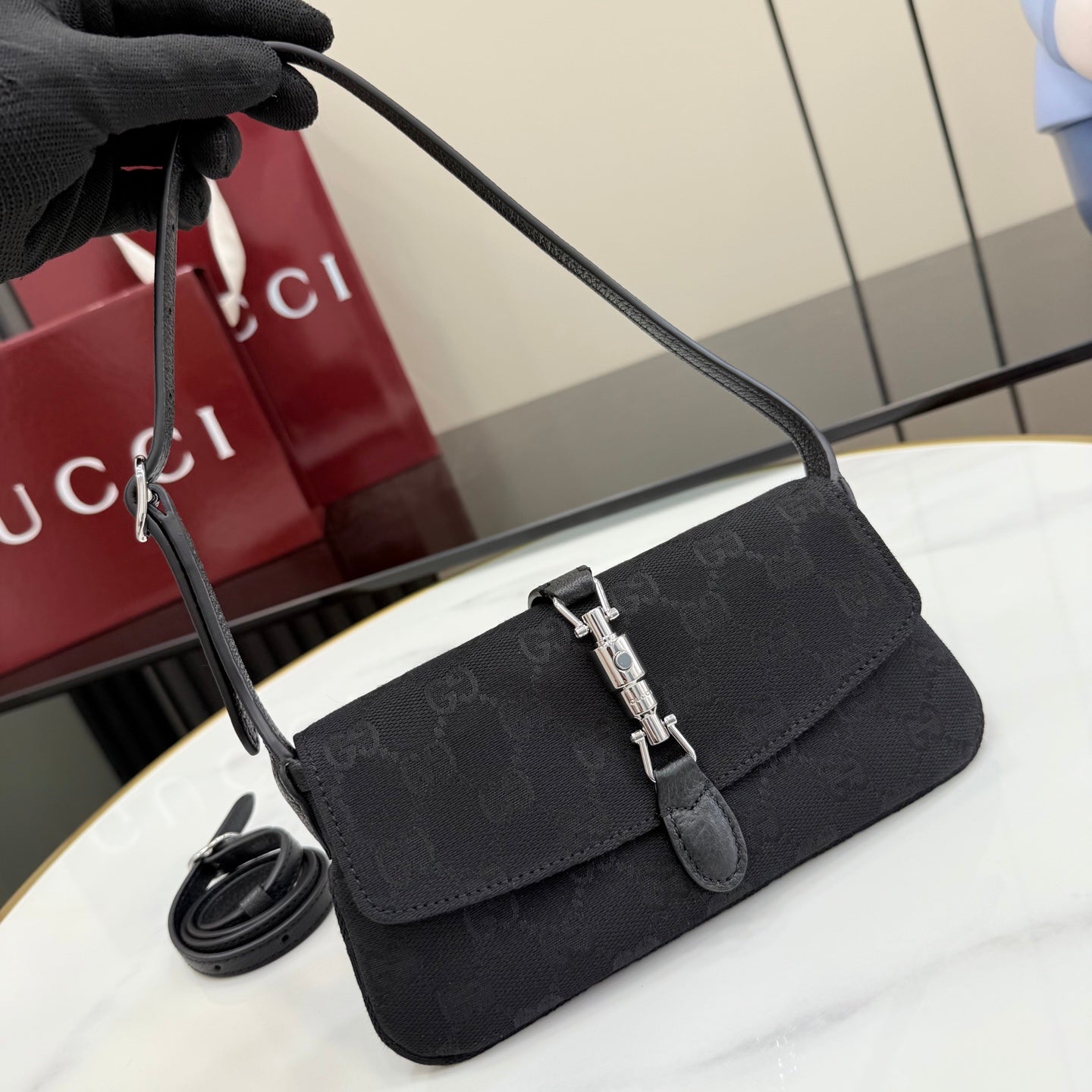 Gucci bag, black flap crossbody with silver buckle and leather strap