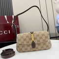 Beige and dark brown GG-pattern shoulder bag with gold clasp and adjustable strap