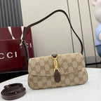 Beige and dark brown GG-pattern shoulder bag with gold clasp and adjustable strap