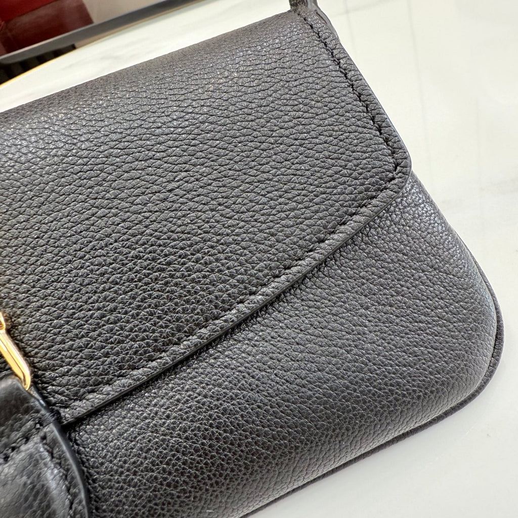 Gucci bag, textured gray leather with stitched flap detail and rounded corner
