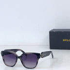 Bvlgari square sunglasses with dark frame and purple-tinted lenses