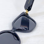 Bvlgari cat-eye sunglasses in dark frame with gradient dark lenses