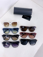 Bvlgari sunglasses set with white, blue, burgundy, black, and purple frames plus cases