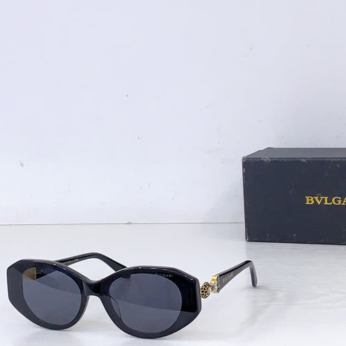 Bvlgari black oversized sunglasses with dark lenses and curved frames