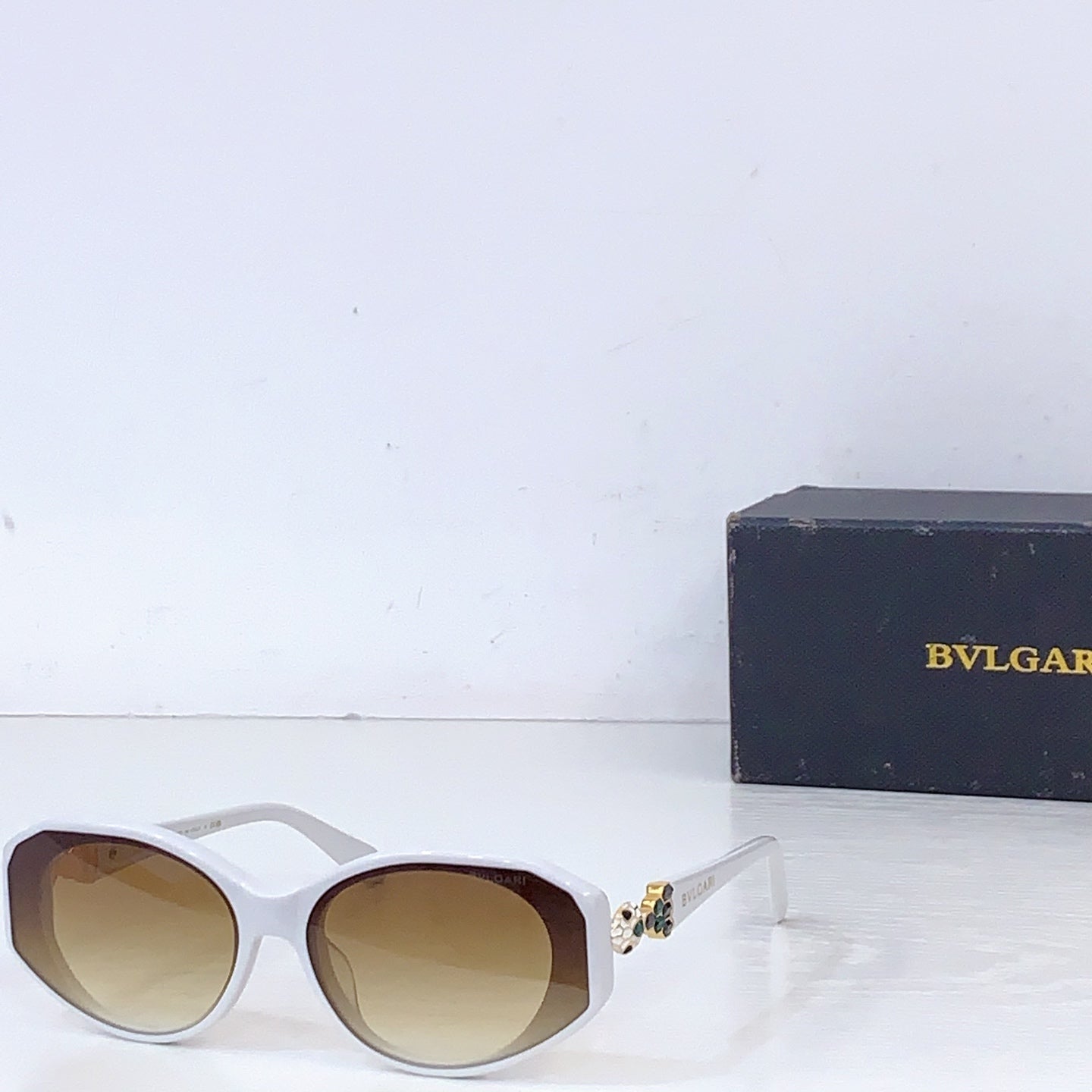 Bvlgari white oversized sunglasses with tan gradient lenses and gold-tone hinge