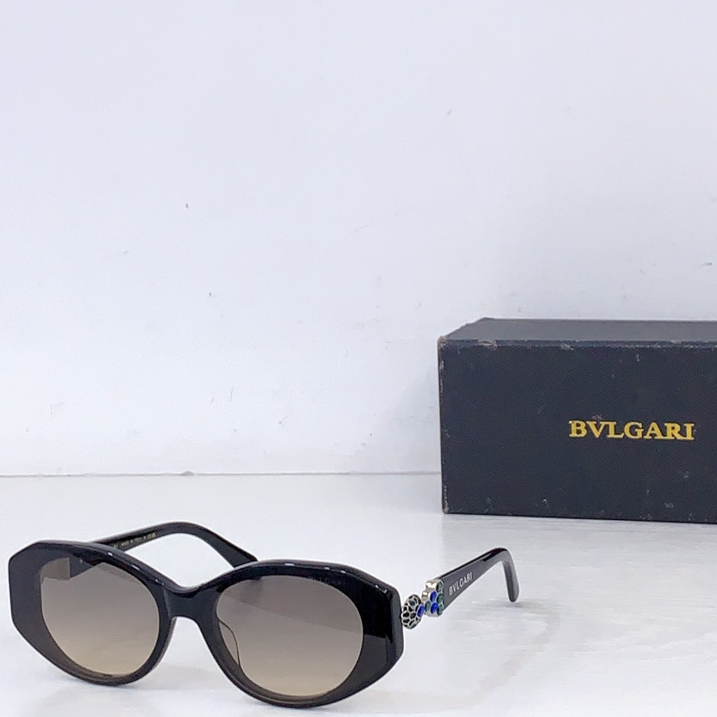Bvlgari dark sunglasses with smoky lenses and glossy black frames