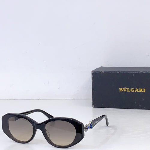 Bvlgari dark sunglasses with smoky lenses and glossy black frames