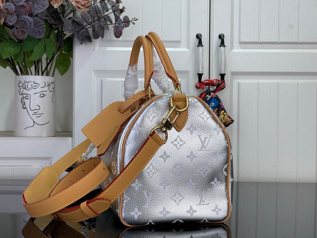 Monogram canvas shoulder bag in light silver with tan strap and leather tags