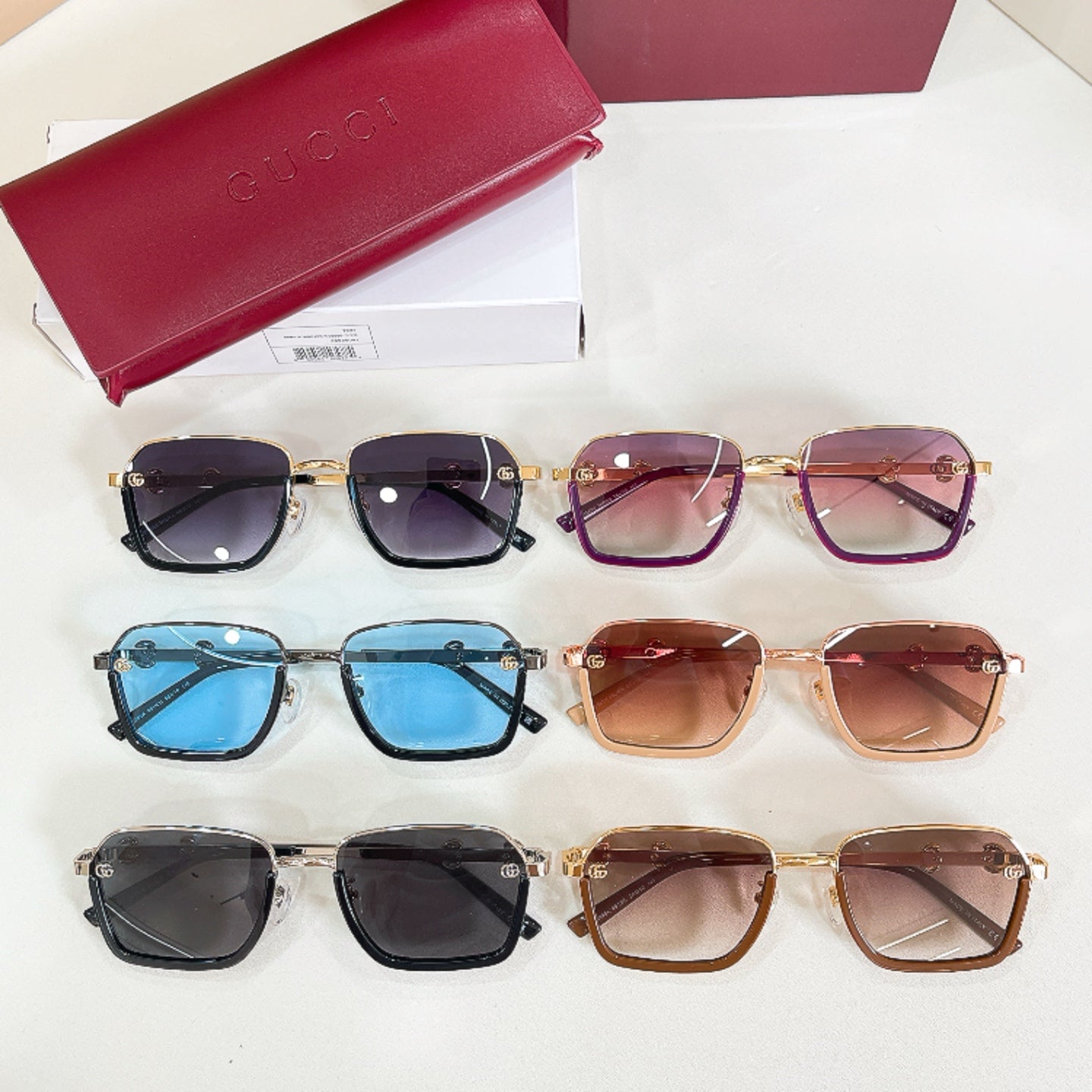 Assorted square sunglasses with gradient lenses and gold-tone decorative hardware