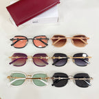Mixed round sunglasses set with pink, purple, green, and dark lenses.
