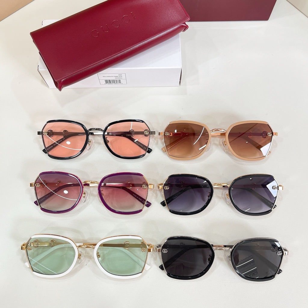 Assorted round sunglasses set with colored lenses and gold logo hardware.
