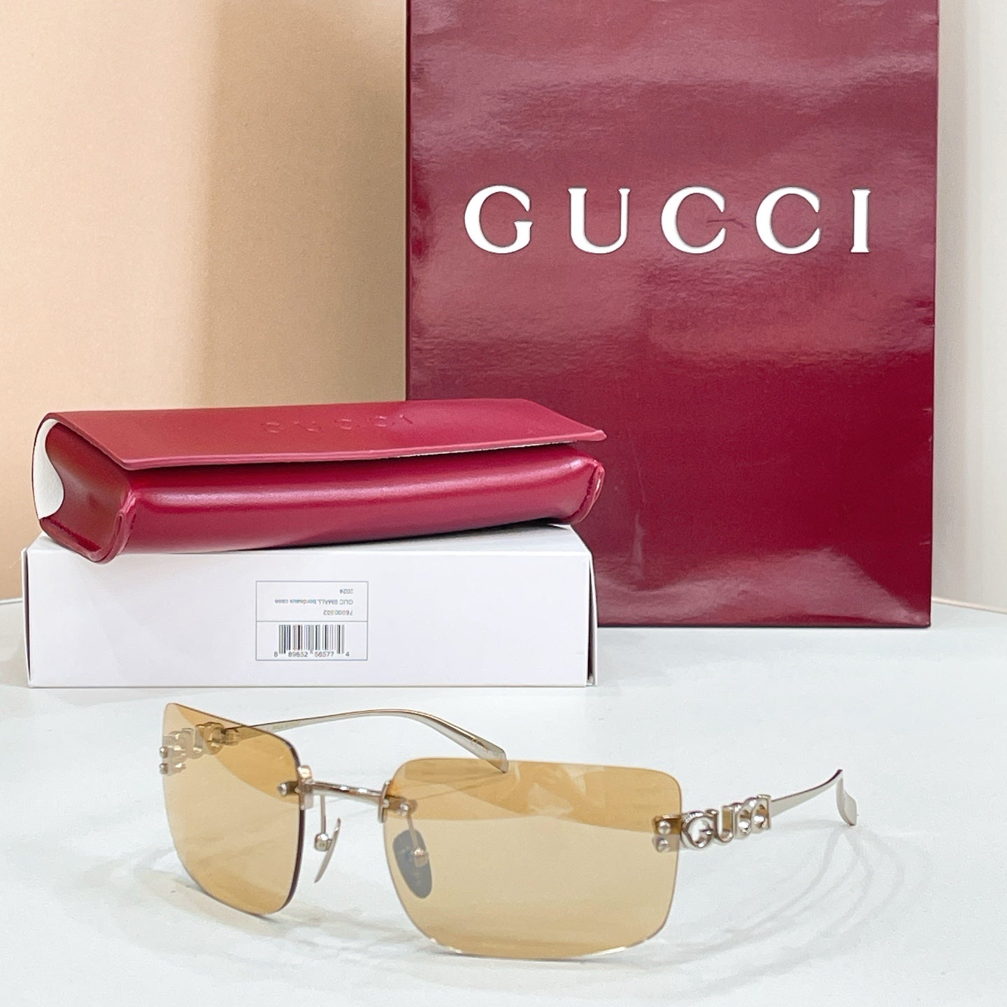 Sunglasses with gold frame and amber gradient lenses