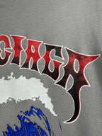 Light gray T-shirt with large red gothic-style lettering and white splatter