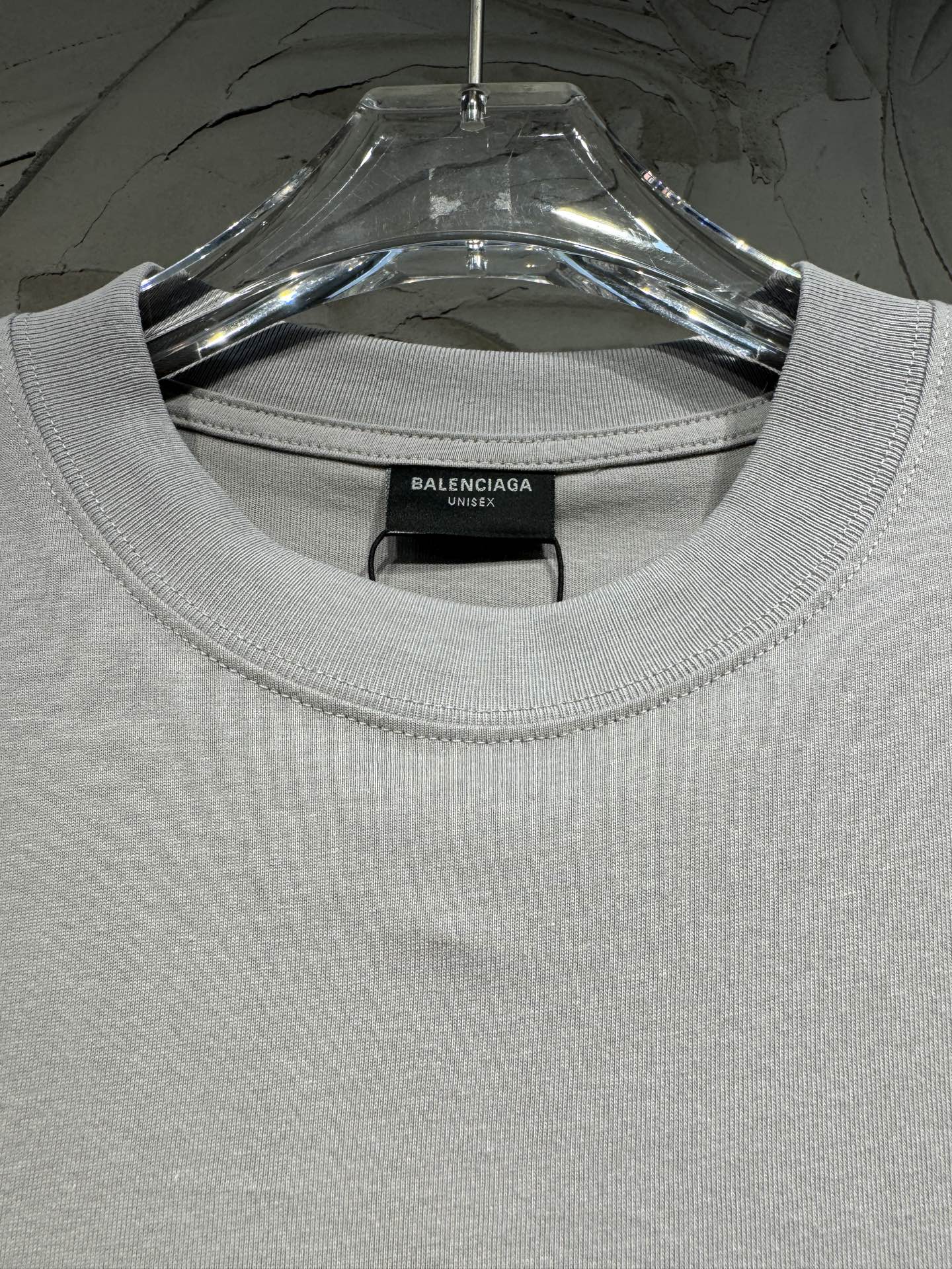 Light gray crewneck T-shirt collar with ribbed neckline and inner label