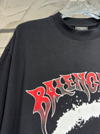 Charcoal graphic T-shirt showing red-and-white stylized lettering across chest