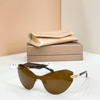 Brown gradient sunglasses with black frame and gold-tone temple accents