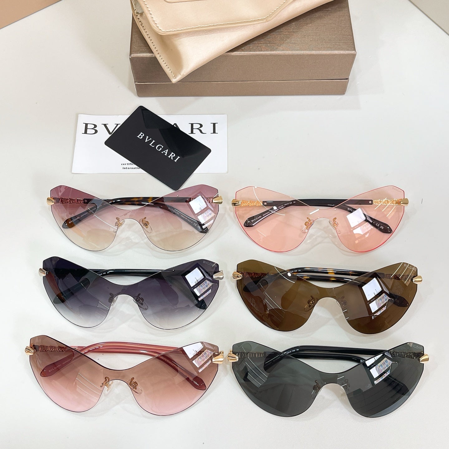 Set of gradient sunglasses with gold-tone accents and varying lens colors