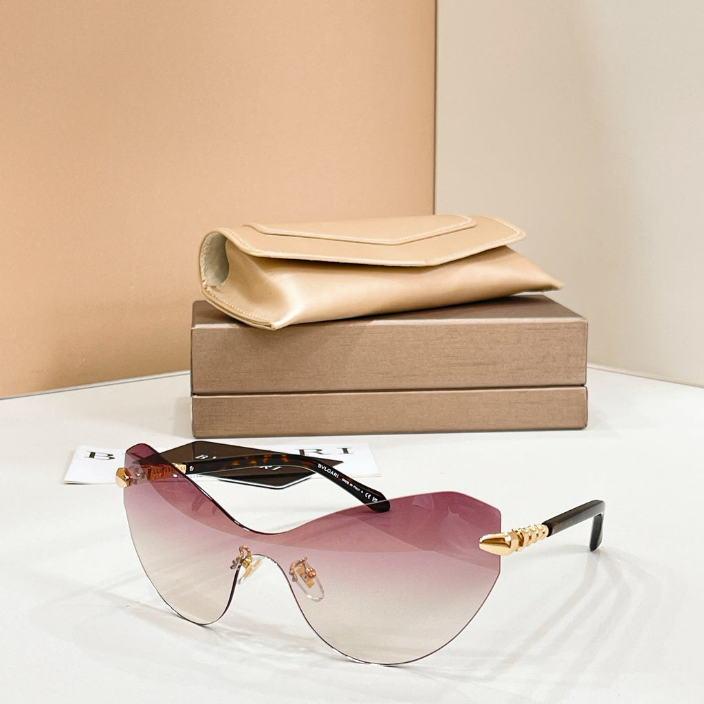 Pink gradient sunglasses with black frame and gold-tone temple accents