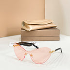 Light pink gradient sunglasses with black frame and red temple details