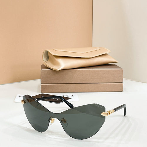 Dark green gradient sunglasses with black frame and gold-tone temple tips