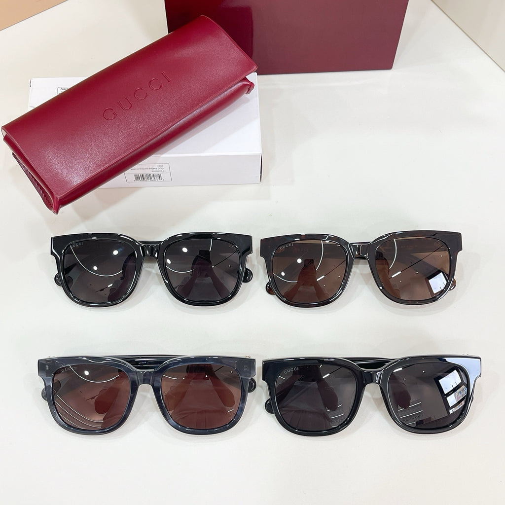 Gucci sunglasses assortment with red case and six pairs of sunglasses