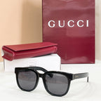 Gucci square sunglasses with black frames and smoked lenses