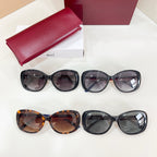 Two pairs of sunglasses: black and tortoiseshell with matching cases