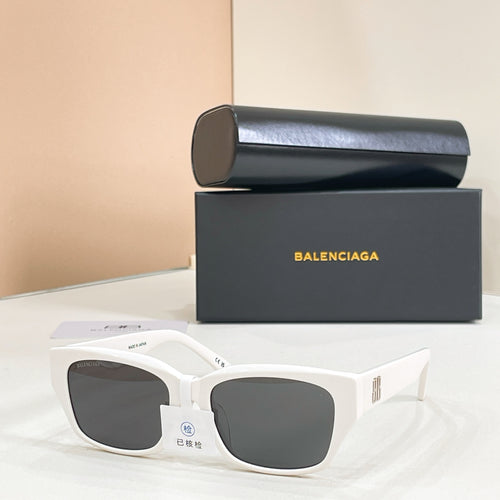 White sunglasses with dark lenses, angular square frames and slim temple tips.