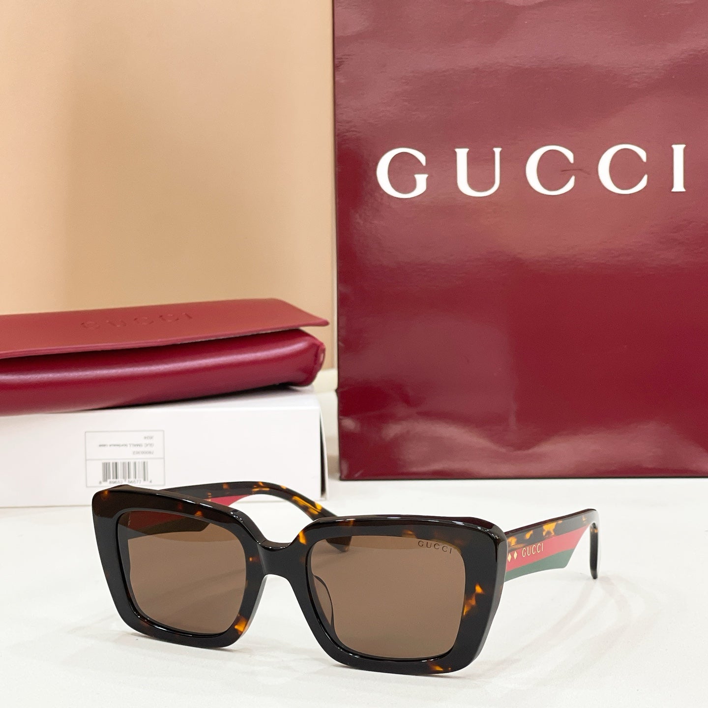 Square tortoiseshell sunglasses with brown-tinted gradient lenses