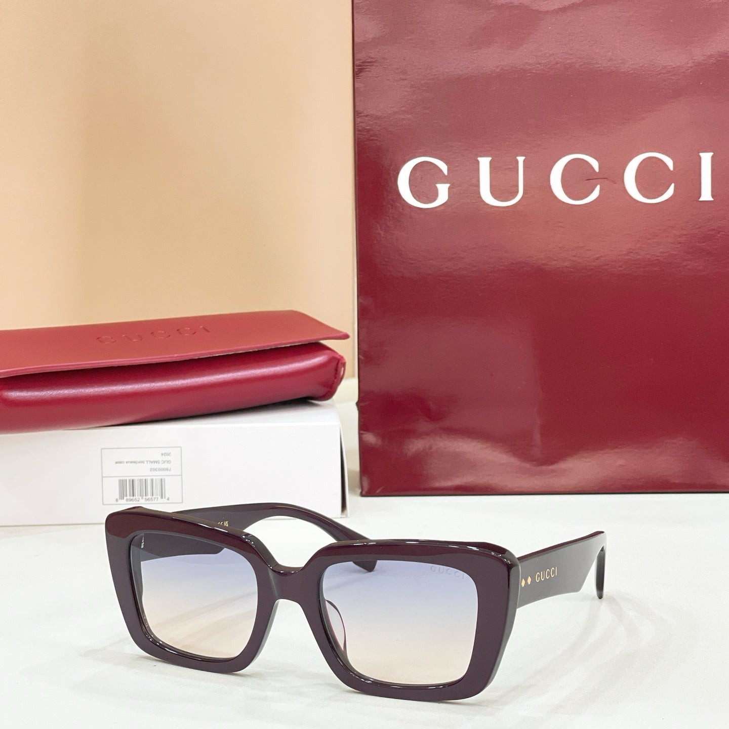 Square dark tortoiseshell sunglasses with clear light-tinted lenses
