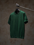 Green Dior crewneck short-sleeve knit top on hanger
