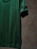 Green Dior crewneck knit top, side view on hanger