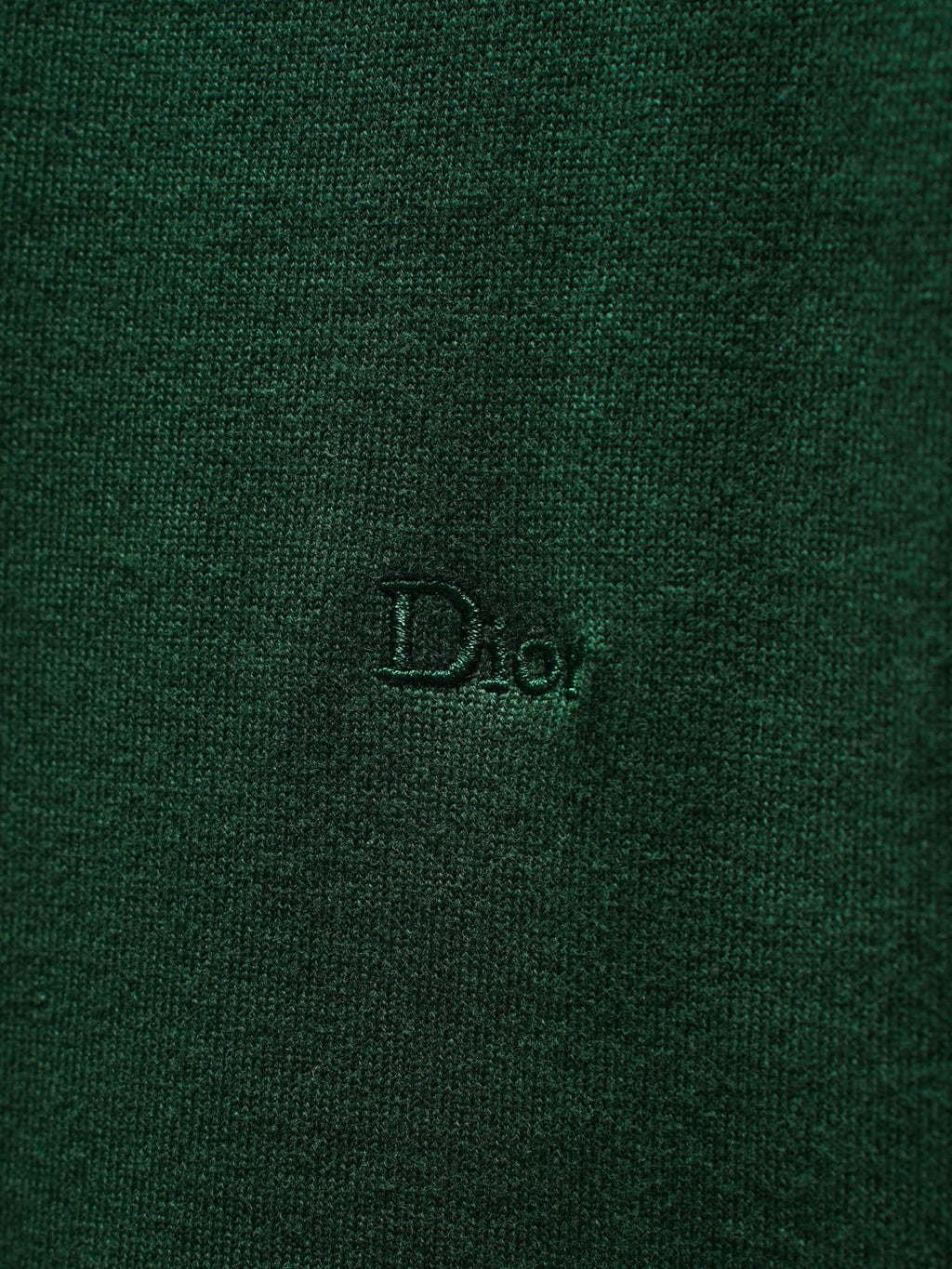 Green Dior knit top logo detail on fabric