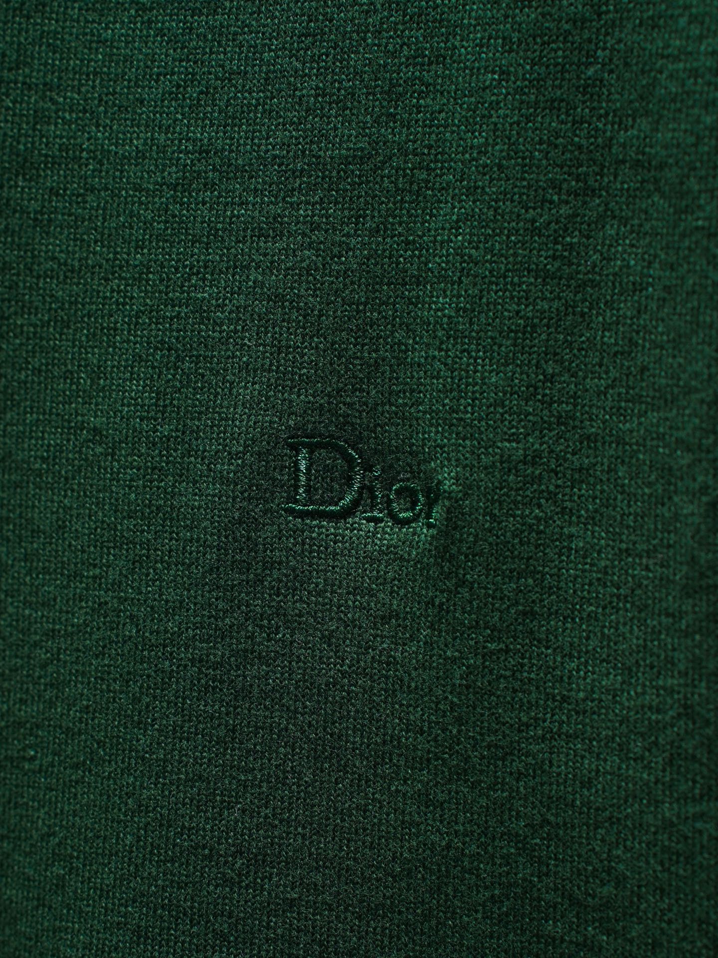 Green Dior knit top logo detail on fabric