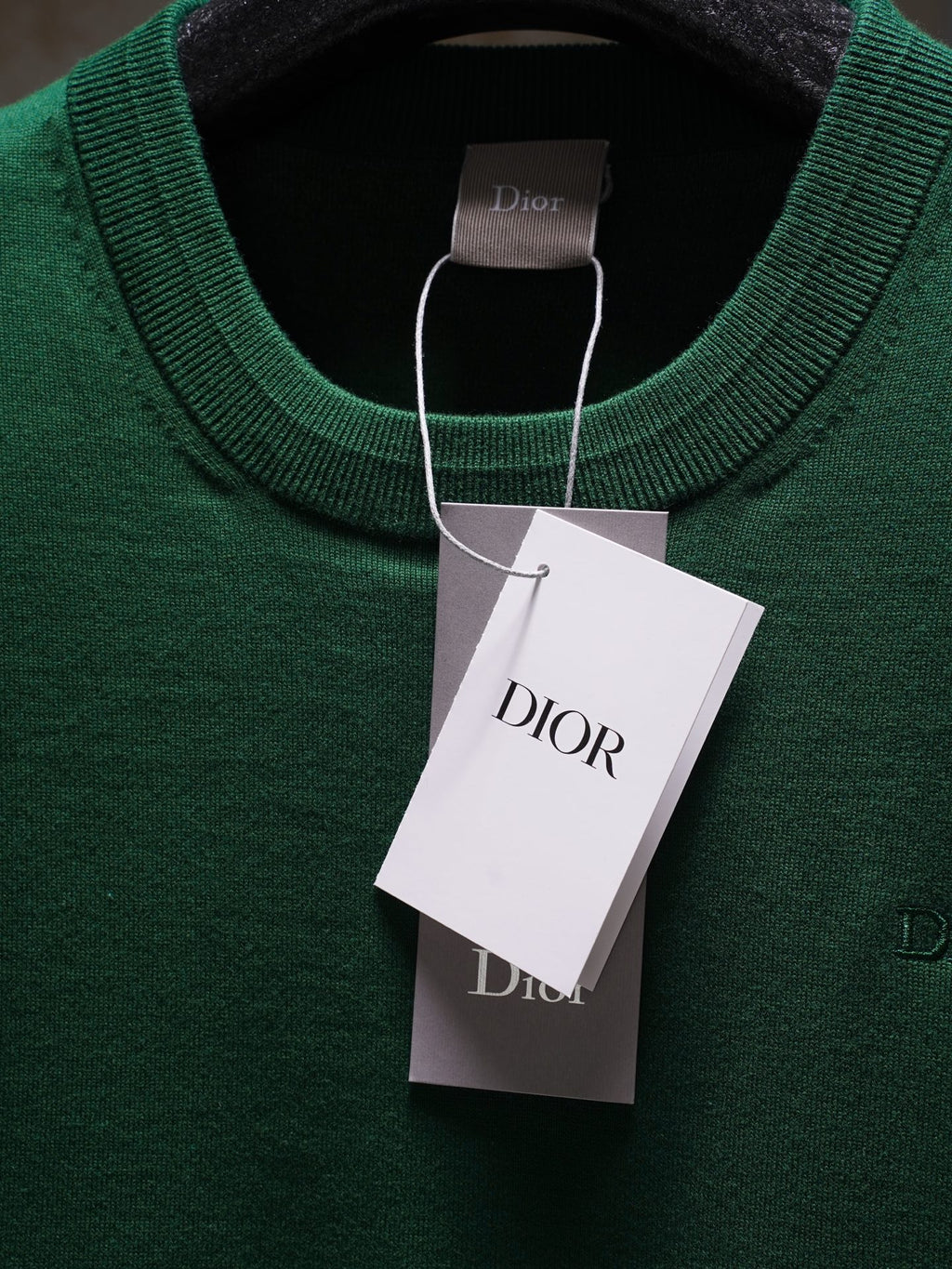 Dior green knit top with round neckline and hanging tag
