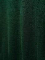 Green Dior knit fabric close-up with subtle texture