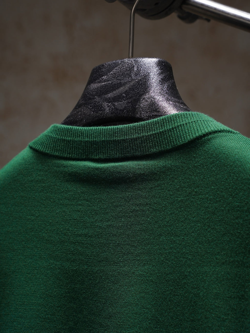 Green Dior crewneck knit top, back collar close-up