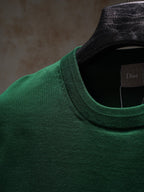 Green Dior crewneck knit top neckline on hanger with label