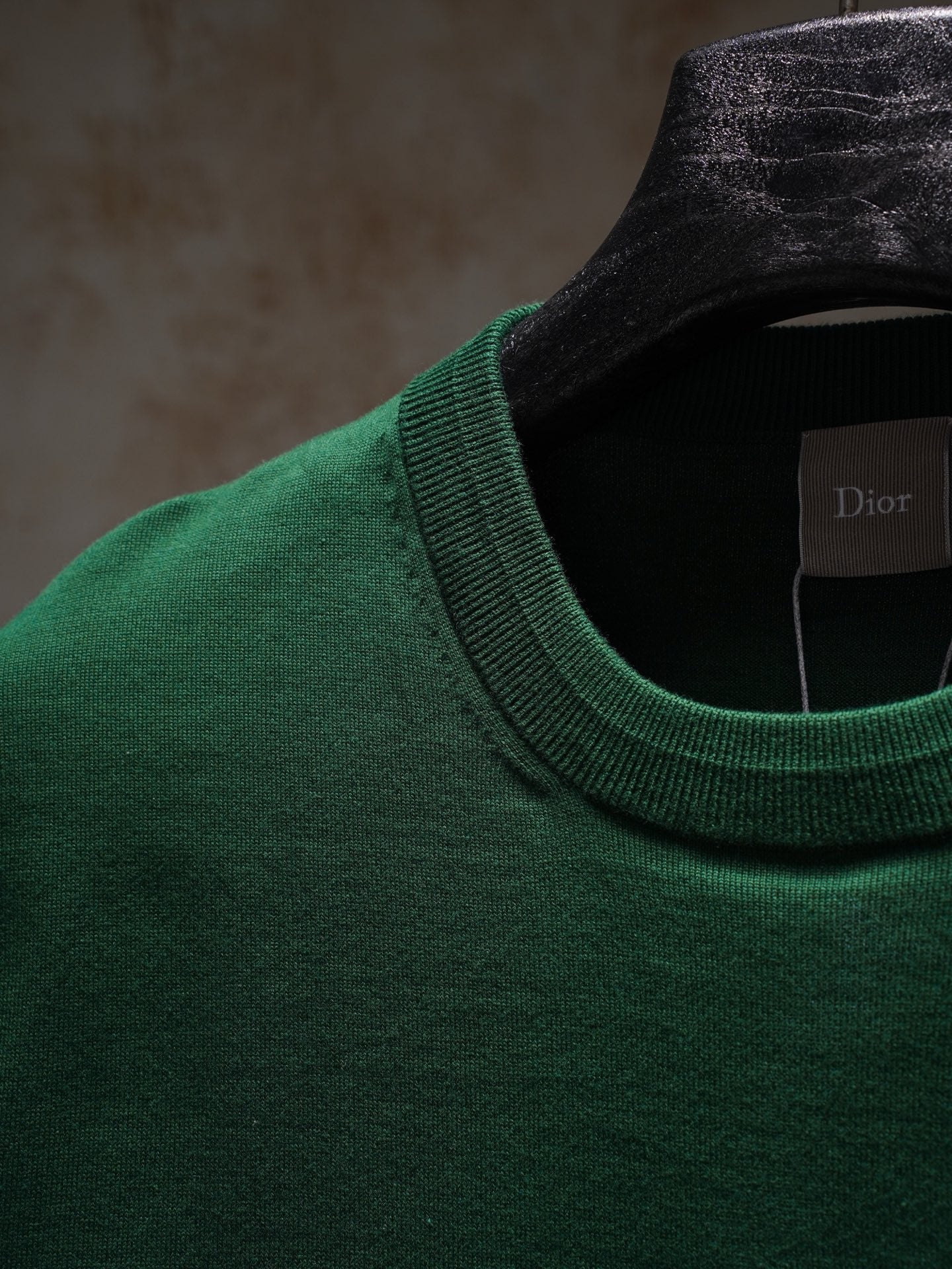 Green Dior crewneck knit top neckline on hanger with label