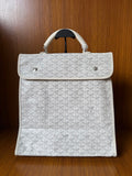 Designer monogram tote bag in light gray with top flap and white handles