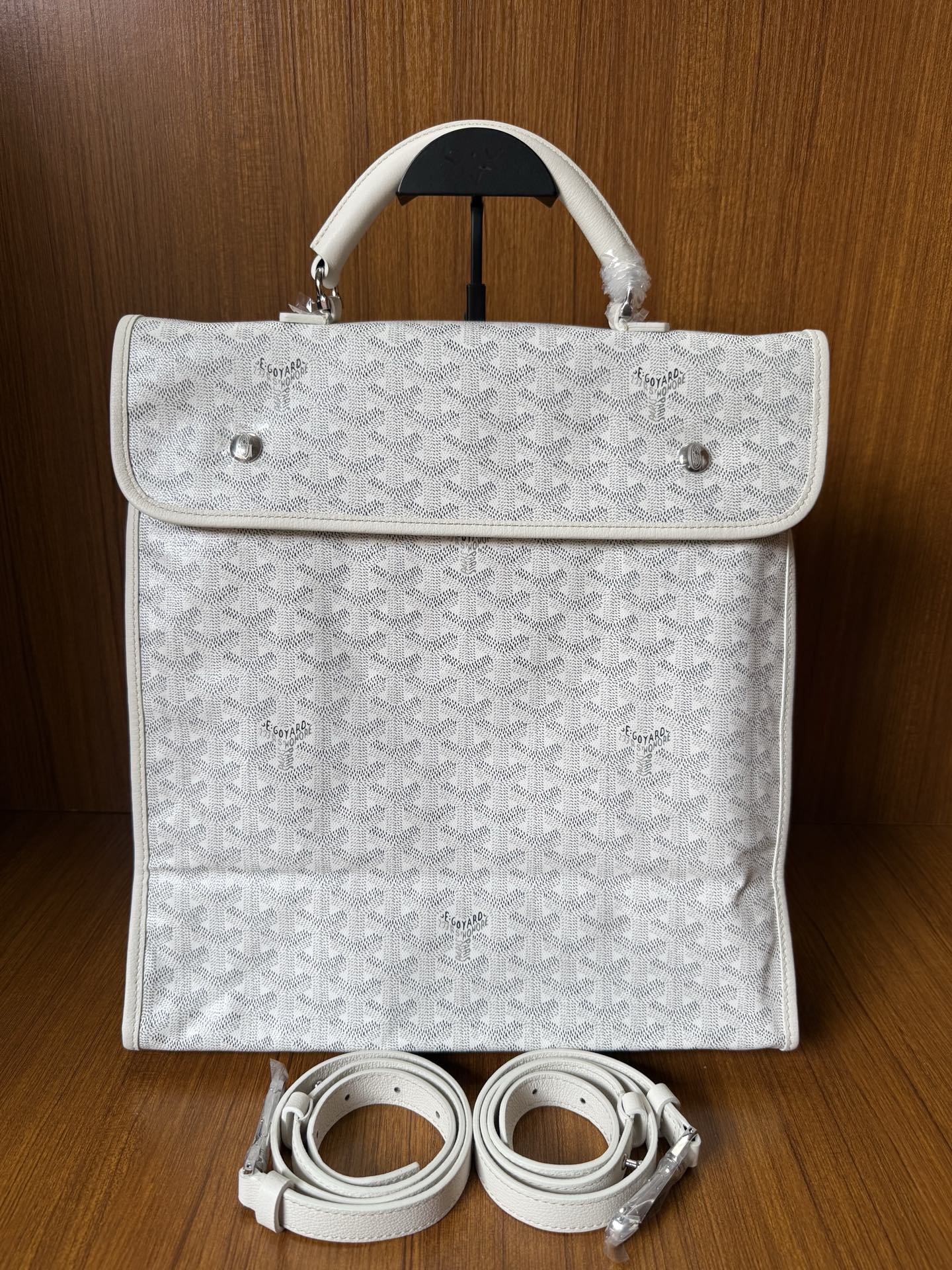 Designer monogram tote bag in light gray with flap and included belt strap