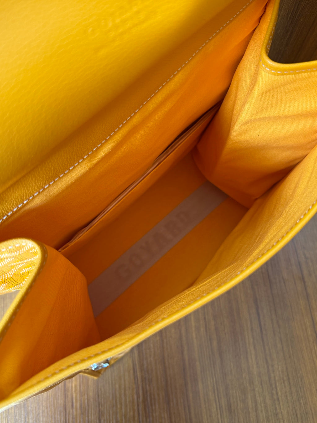 Yellow tote bag interior with slip pocket and stitched lining