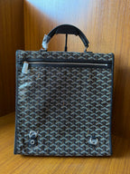 Goyardine patterned bag with top handle, rear view and snap details, dark blue-gray.