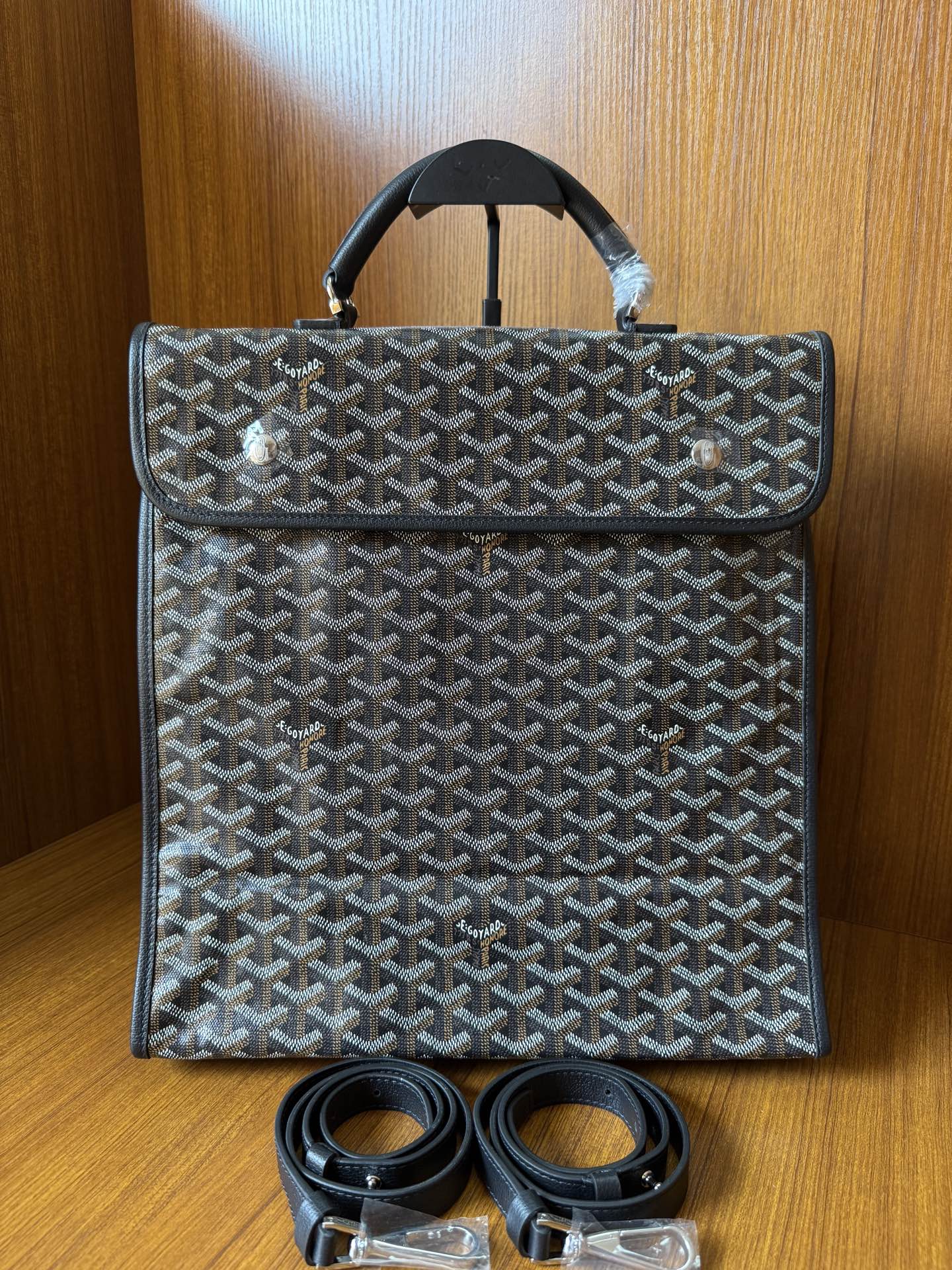 Goyardine patterned bag with top handle and matching strap, dark blue-gray.