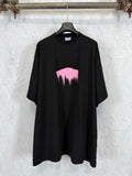Balenciaga black T-shirt with pink graphic heart and dripping paint