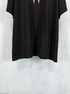 Balenciaga black T-shirt hem, cropped view