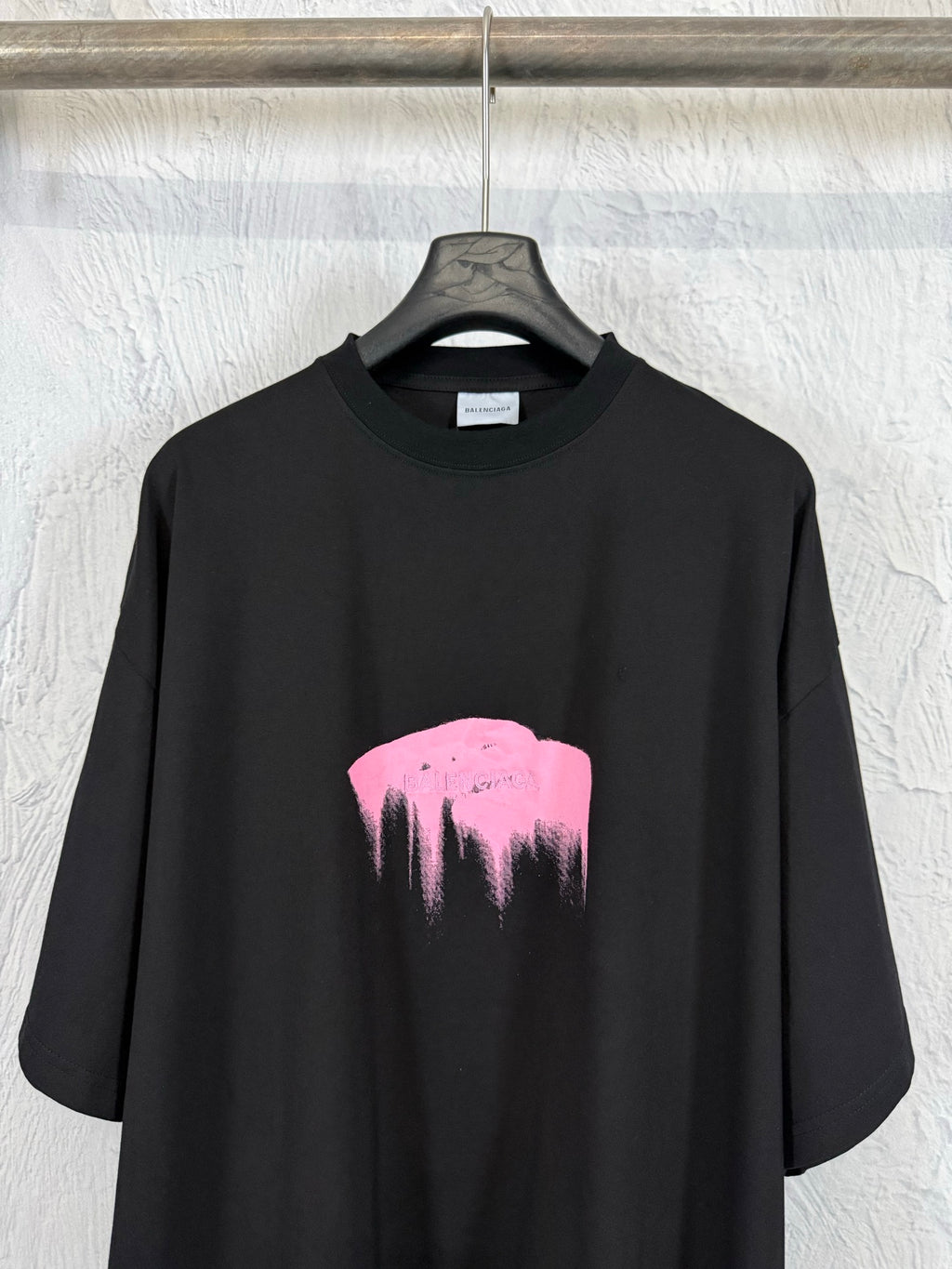 Balenciaga black T-shirt with centered pink heart graphic
