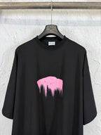 Balenciaga black T-shirt with centered pink heart graphic